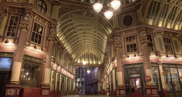 Photo of Leadenhall Market at night in London, UK.