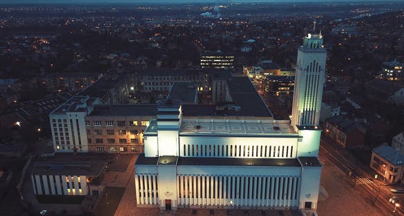 Kaunas our Lord Jesus Christ's Resurrection Basilica at night, Lithuania. Drone aerial view.