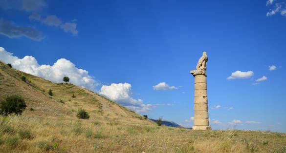 photo of Karakus Tumulus (Monument Grave). The Tumulus construction is a traditional memorial grave of Commagene Royal Family. The UNESCO World Heritage. Anatolia, Adiyaman, Turkey.