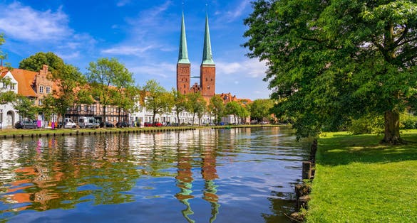 A view of the old town of Luebeck (German: Lübeck), Germany, with the Luebeck Cathedral (German: Dom zu Lübeck, or Lübecker Dom) across the river Trave.