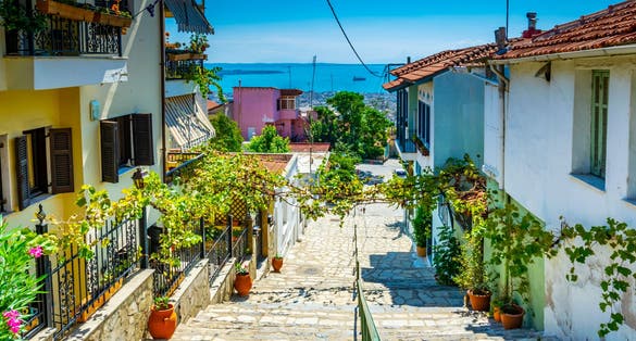 Photo of a narrow street in the old town of Thessaloniki, Greece.