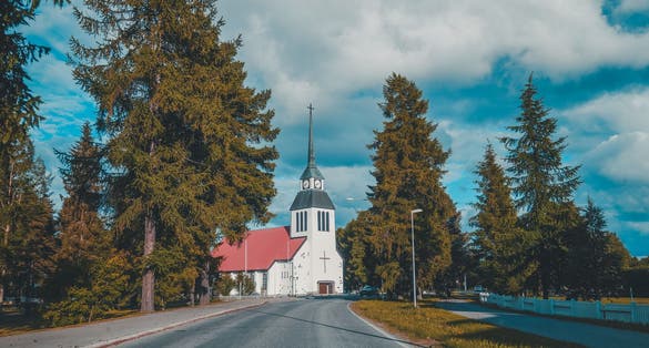Photo of the church of Kuusamo in northern Finland on a summer day.