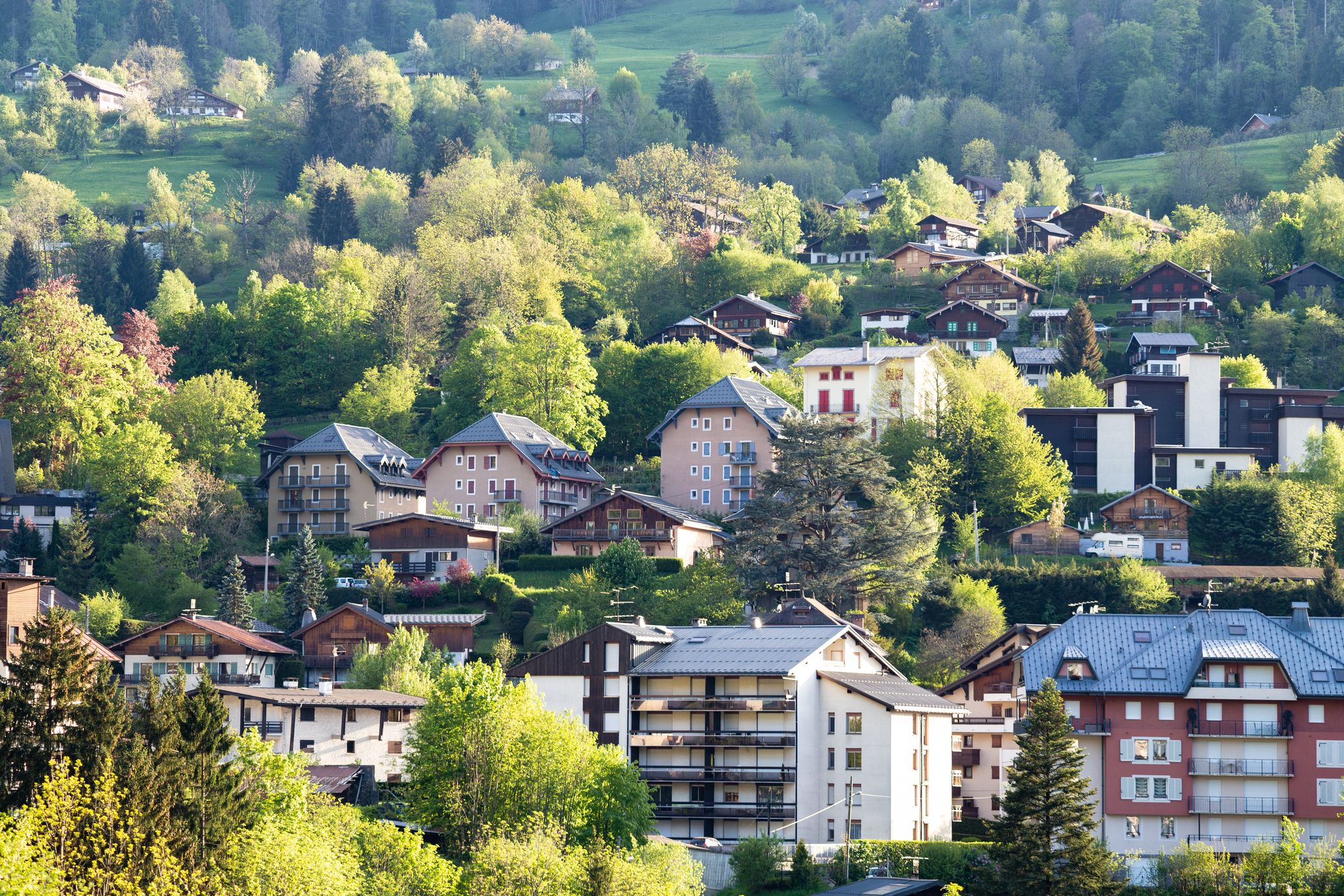 photo of French alps mountain and Saint-Gervais-les-Bains village, in spring in France.