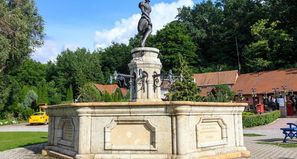 Photo of fountain at entrance to Valley of a Beautiful Woman, Valley is home to many restaurants and cellars offering Egri Bikavér (Bull's Blood) and other hungarian wines.
