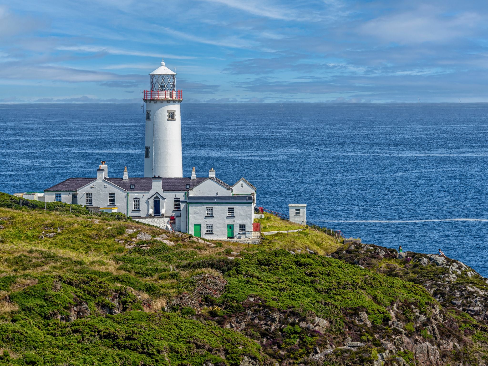 photo of view of Lighthouse perched on hill, ocean view at Municipal District of Letterkenny - Milford, County Donegal, Ireland.
