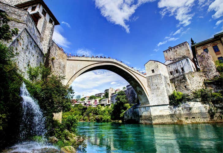 Photo of Stari Most is a reconstruction of a 16th-century Ottoman bridge in the city of Mostar in Bosnia and Herzegovina that crosses the river Neretva and connects two parts of the city.