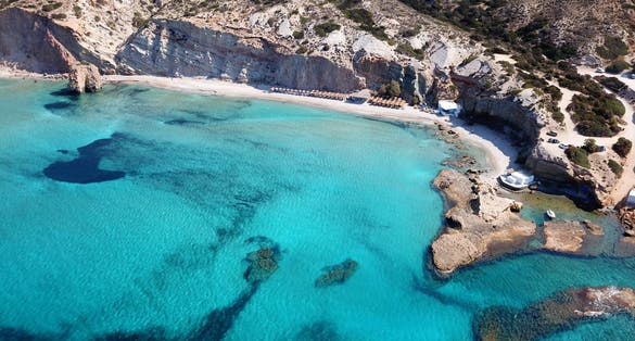 photo of view of iconic volcanic white chalk iconic beach of Firiplaka, Milos island, Cyclades, Greece