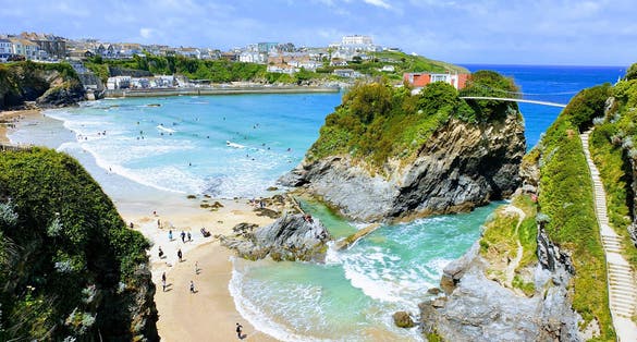 Photo of Newquay Beach on a hot summers day.