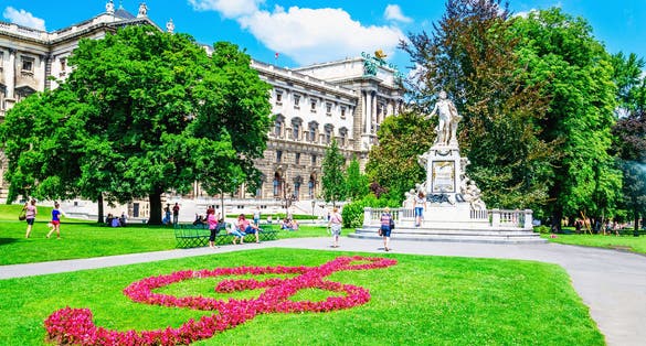 photo of view of Statue of famous composer Wolfgang Amadeus Mozart in the Burggarten, Vienna, Austria.