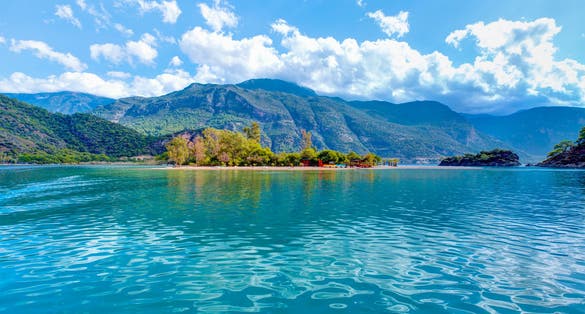 Photo of Oludeniz beautiful beach with blue sky, Fethiye, Mugla.