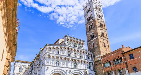 photo of view of Lucca, Italy. Façade and bell tower of Lucca Cathedral.