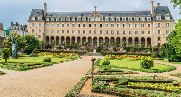 Photo of Saint George Palace (Palais Saint-Georges) in French garden is an historic building in the city of Rennes.