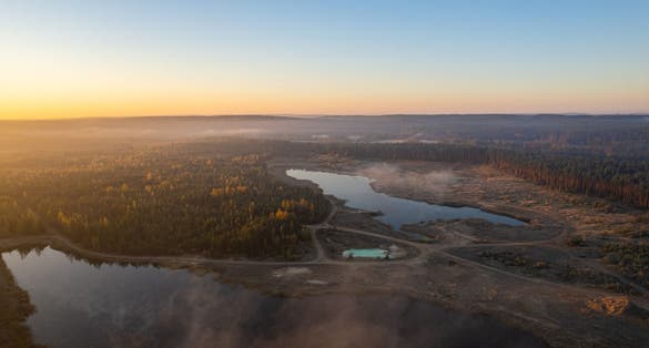 photo of aerial autumn fall sunrise dawn view in neris regional park, Lithuania.