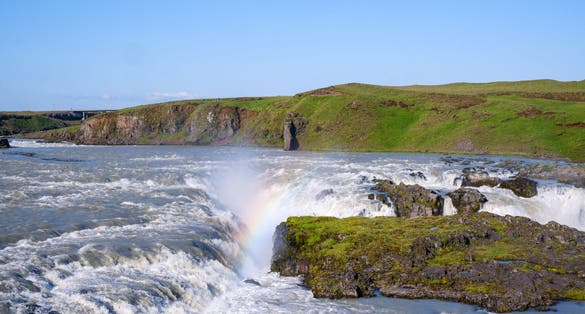 photo of rainbow over the Urriðafoss waterfall in the river Þjórsá, South Iceland.