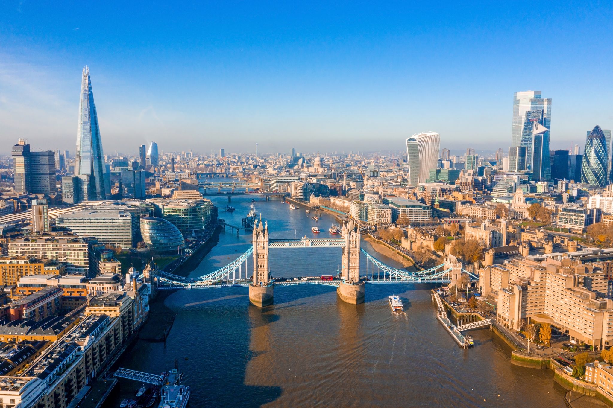 Photo of aerial view of the Iconic London Tower Bridge on the Thames River, UK.