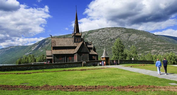 Norvegian stave church Lomskyrkja in Lom, Norway. The historic wooden stave Lom Stave Church, Middle ages.