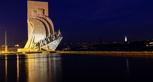 Photo of Padrao dos Descobrimentos (Monument to the Discoveries) at night, Lisbon, Portugal.