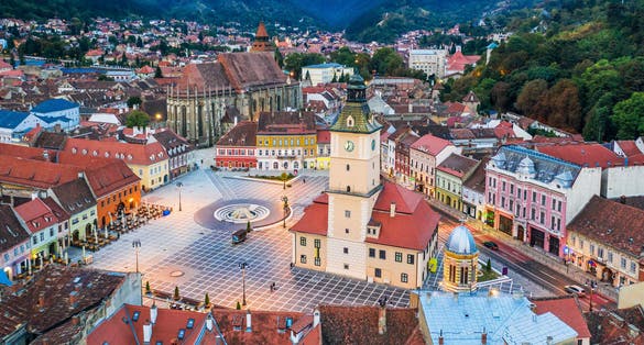 Photo of Brasov, Romania aerial view of Medieval Council House in the Main Square of the Old Town.