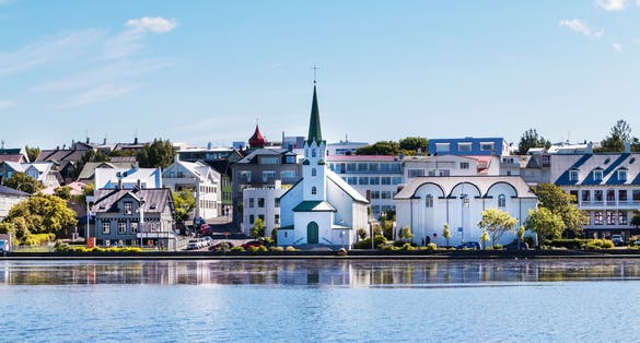 Photo of Reykjavik, Iceland city scape, lake quay in city center.