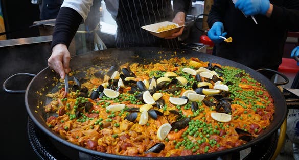 Photo of Paella street food stall at Borough Market, London, UK.