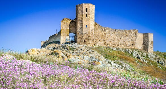 photo of view of Enisala Fortress, Dobruja, Romania. Ruins of medieval stronghold over the Razelm Lake, Tulcea.