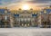 Photo of Versailles palace outside Paris at sunset, France.