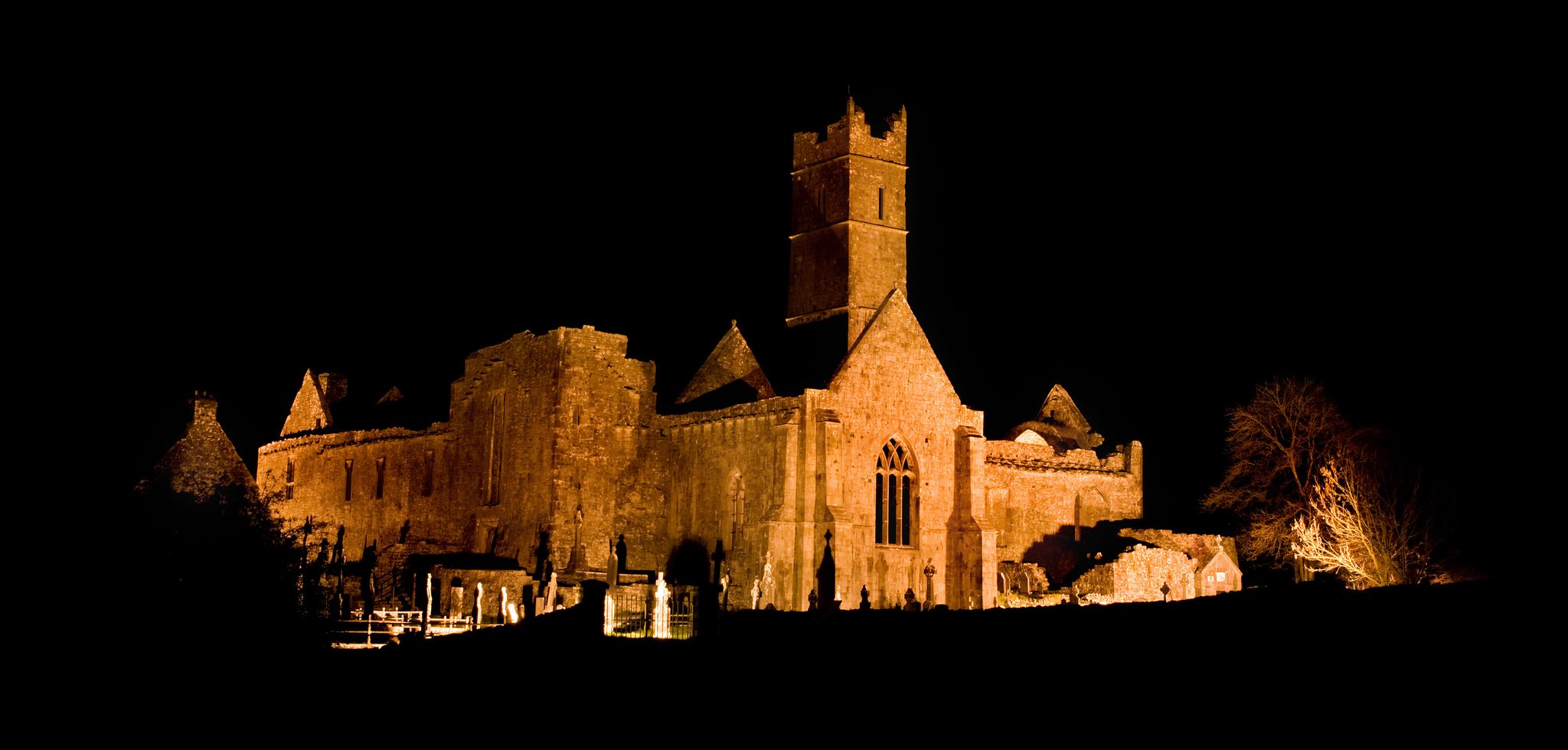 photo of view of Quin Abbey at night, Killaloe Municipal District, Ireland.