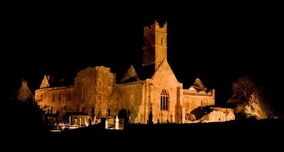photo of view of Quin Abbey at night, Killaloe Municipal District, Ireland.