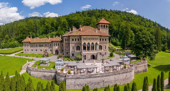 Photo of Panoramic view of Cantacuzino Castle in Busteni, Romania.Southern Carpathians Mountains, Transylvania.
