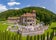 Photo of Panoramic view of Cantacuzino Castle in Busteni, Romania.Southern Carpathians Mountains, Transylvania.