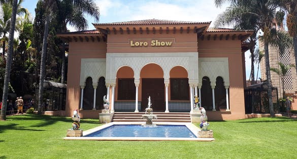 Photo of entrance to building for parrot show in Loro Parque or Parrot park, Spain.