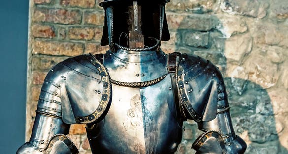 Gallery of knight's armor. Knight's iron armor in the museum. toned.