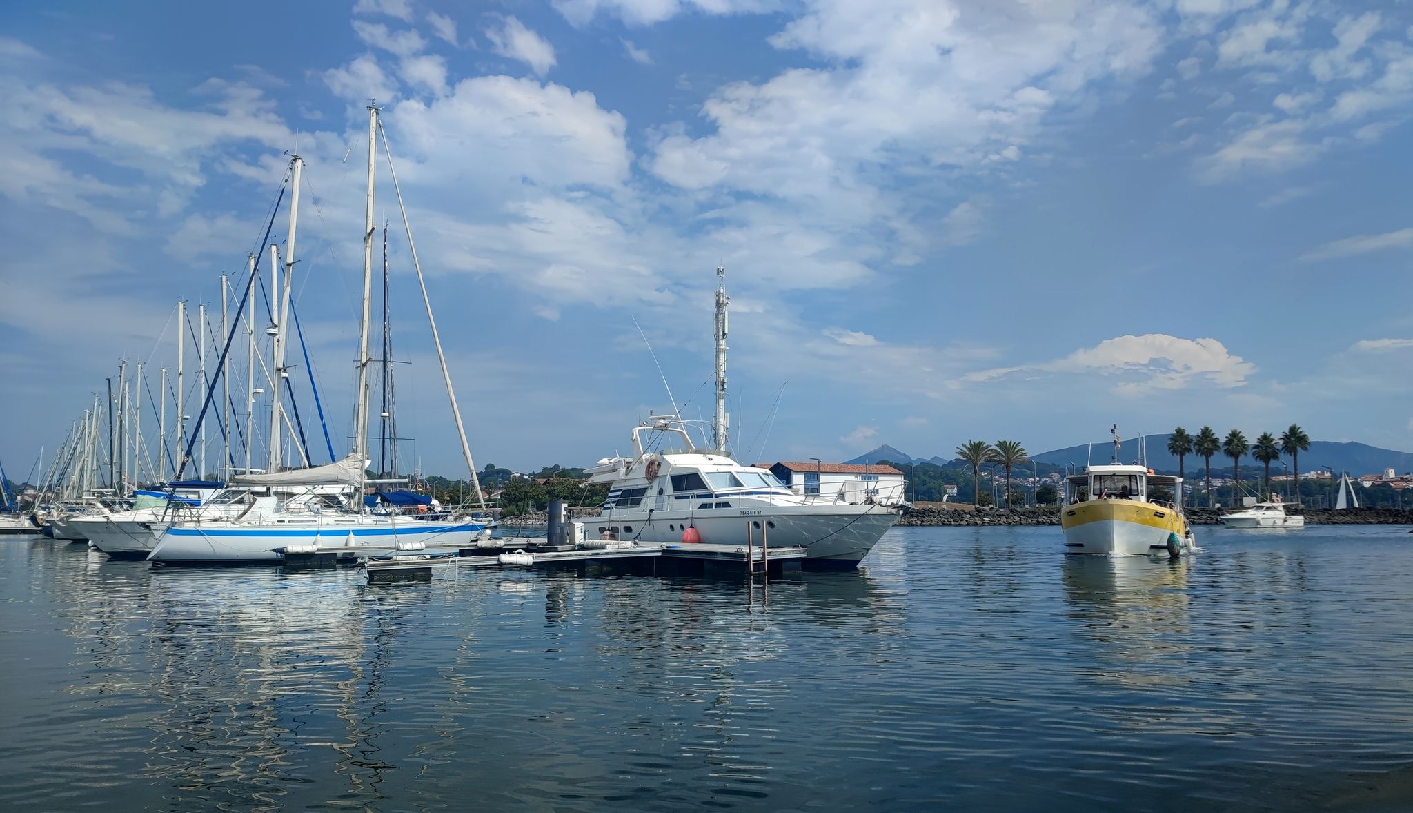 Photo of aerial view of the city of Hendaye (France). With in the foreground the Joncaux, in the middle the center of Hendaye and the bay of txingudi, and in the background the beach district with the sea.