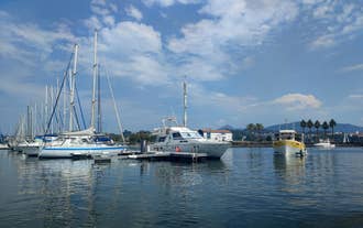Photo of aerial view of the city of Hendaye (France). With in the foreground the Joncaux, in the middle the center of Hendaye and the bay of txingudi, and in the background the beach district with the sea.