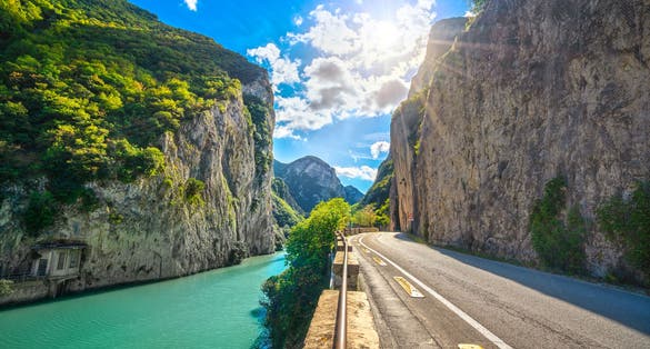 photo of Furlo Pass or Gola del Furlo canyon. Road, river and gorge. Natural reserve. Urbino and Pesaro, Marche, Italy.