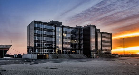 PHOTO OF VIEW OF Modern homes in the Dokken part of the harbor at Esbjerg, Denmark.
