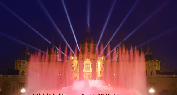Photo of night view of Magic Fountain light show in Barcelona, Spain.