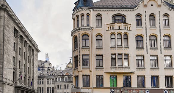 Man at Cat house in Riga, capital of Latvia, at Christmas