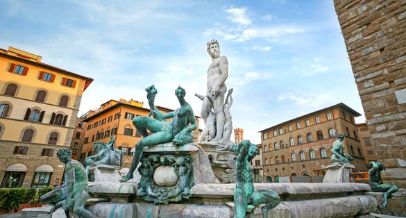 Photo of Fountain of Neptune in Florence in early morning.