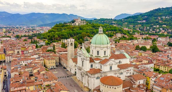 photo of view of Santa Maria Assunta Cathedral, Duomo Nuovo and Duomo Vecchio, Brescia, Italy.