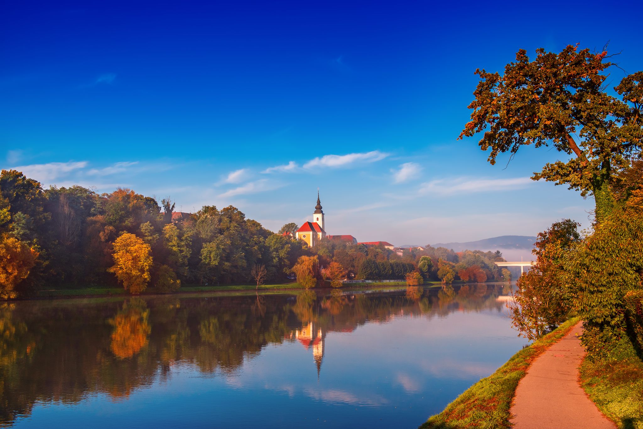Photo of Beautiful view of Maribor city, Slovenia, in the morning with river and castle. Travel outdoor background.