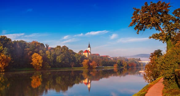 Photo of Beautiful view of Maribor city, Slovenia, in the morning with river and castle. Travel outdoor background.