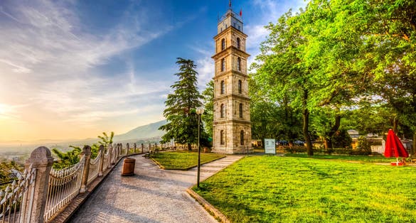 Photo of historical clock tower in Tophane Park, Bursa, Turkey.