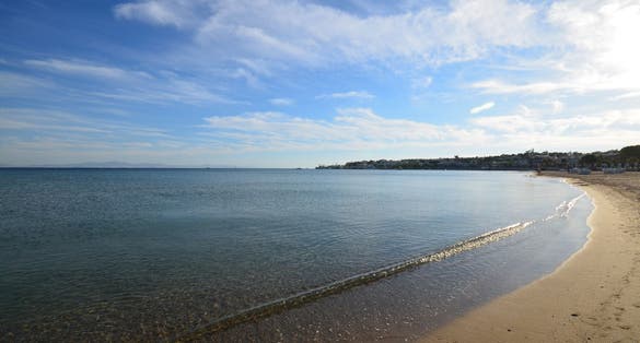 Photo of beautiful Didim beach with blue sky.