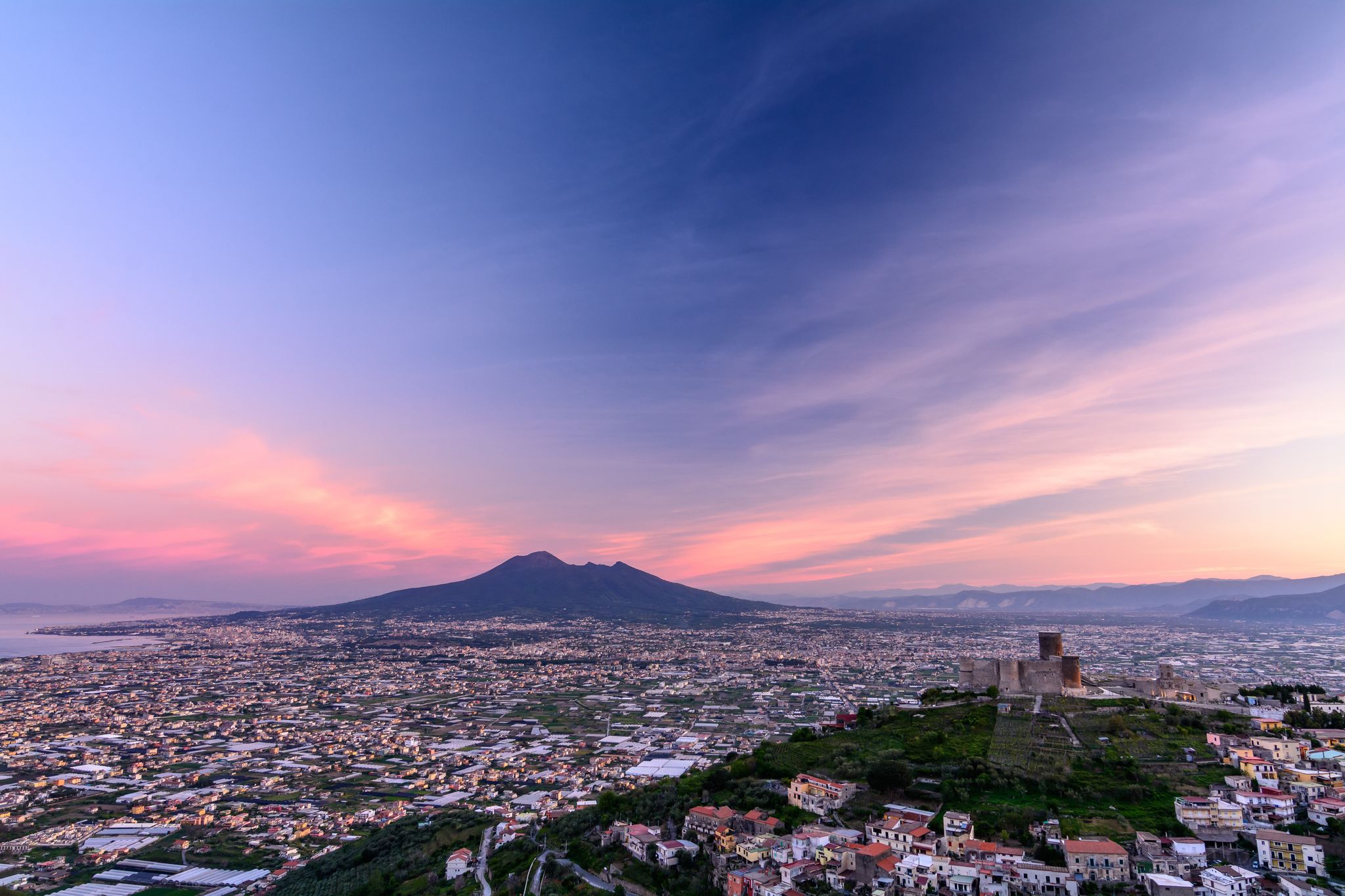 photo of Panorama of Naples and Mount Vesuvius in, Italy. View of Mount Vesuvius, an active volcano in Naples.,Ottaviano Italy.