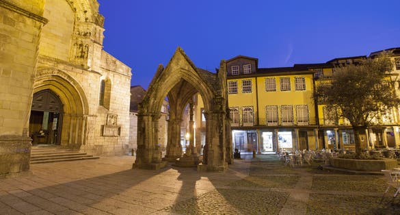 Oliveira square with church and Padrao do Salado monument, Guimaraes, Portugal