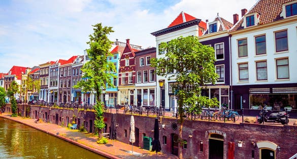 photo of view of This photo captures the serene and picturesque landscape of Utrecht, Netherlands. Featuring charming canals, historic architecture, and lush greenery, Utrecht offers a perfect blend of natural beauty