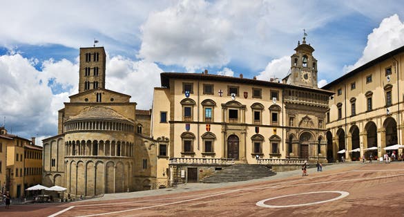 photo of view of Dramatic sky on the famous Piazza Grande square, Arezzo, Tuscany, Italy.