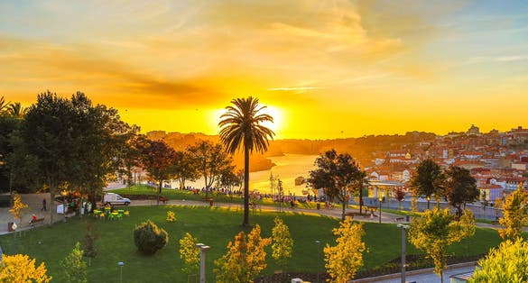 Aerial view of Jardim do Morro, a little public park, in Avenida da Republica from Serra do Pilar at Vila Nova de Gaia, Porto in Portugal. Picturesque urban cityscape at sunset light.