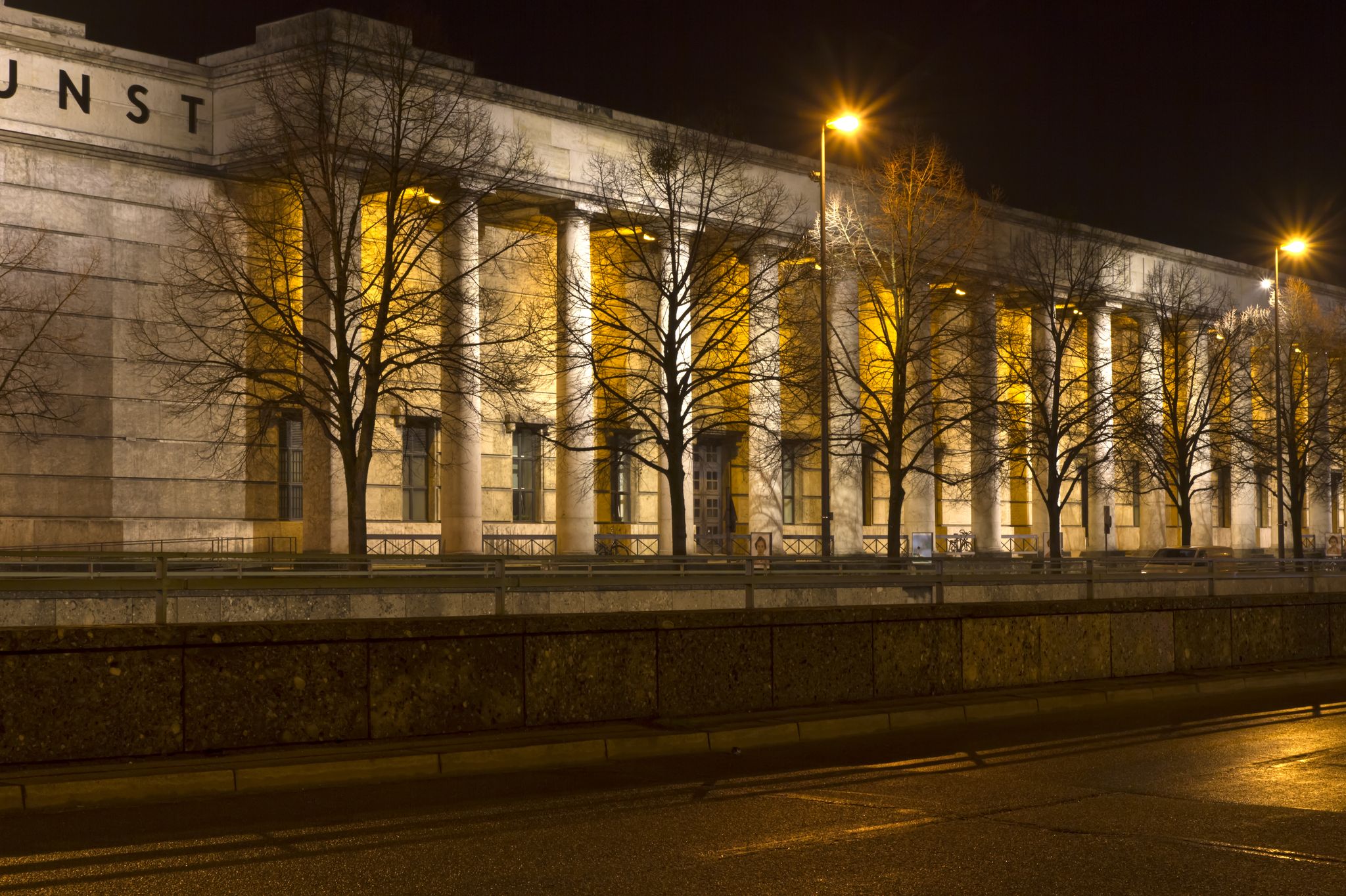photo of "Haus der Kunst" museum in Munich, Germany, at night .